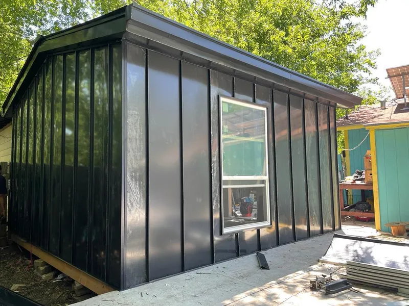 Black standing seam metal wall panels for Roof Inspection in Alliance