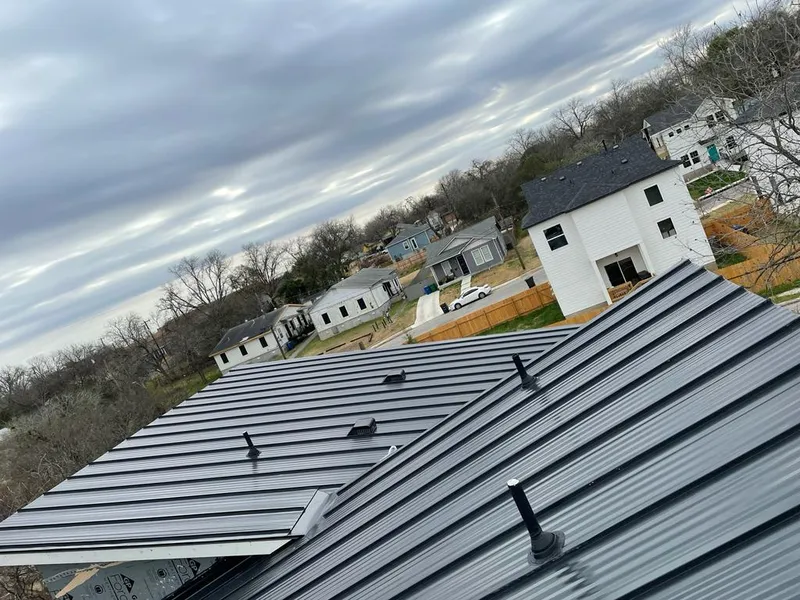 Standing seam metal roof panels with vents for Skylight Repair in Alliance
